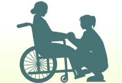 介護士と車椅子