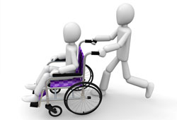 車椅子を介助する人のイメージ