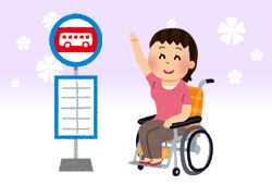 バス停にいる車椅子の女性