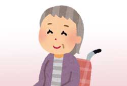 車いすに座り笑う祖母
